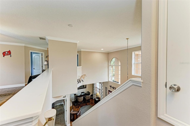 223 Heritage Isles Way, Bradenton, FL 34212 - stairs with crown molding, baseboards, and visible vents