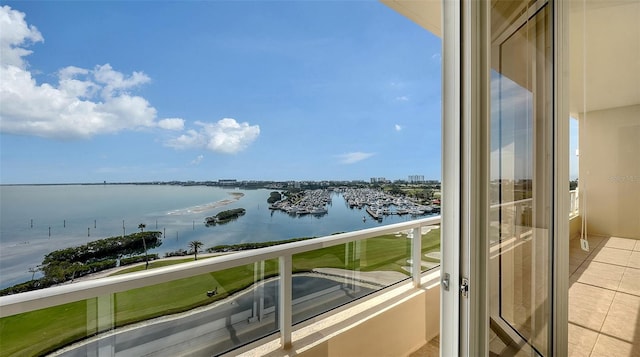 balcony featuring a water view