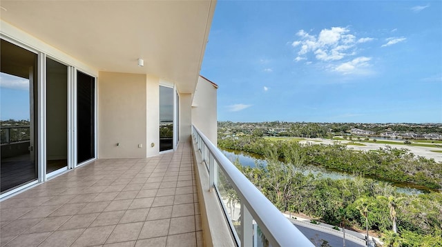 balcony featuring a water view