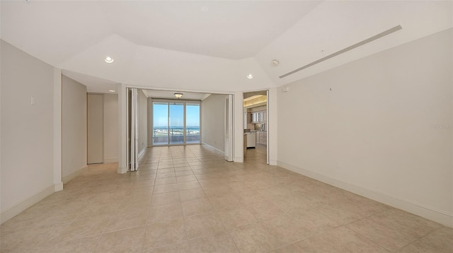 empty room featuring light tile patterned floors