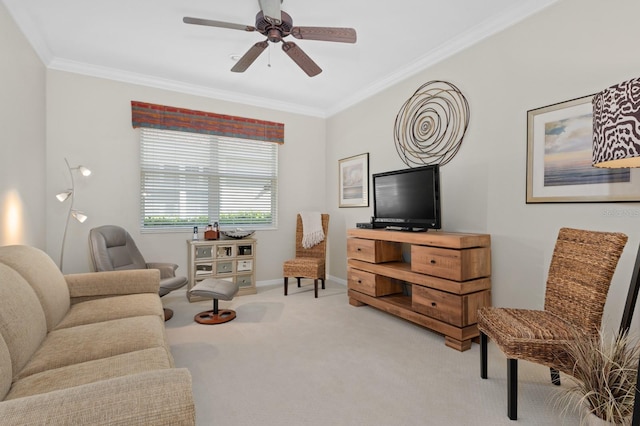 carpeted living room featuring crown molding and ceiling fan