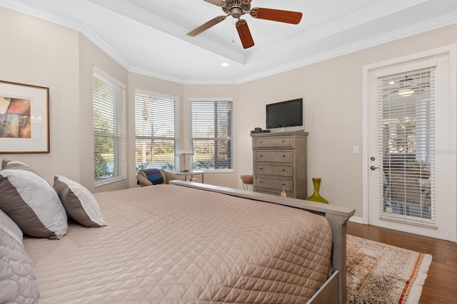 bedroom featuring hardwood / wood-style flooring, crown molding, access to outside, and ceiling fan