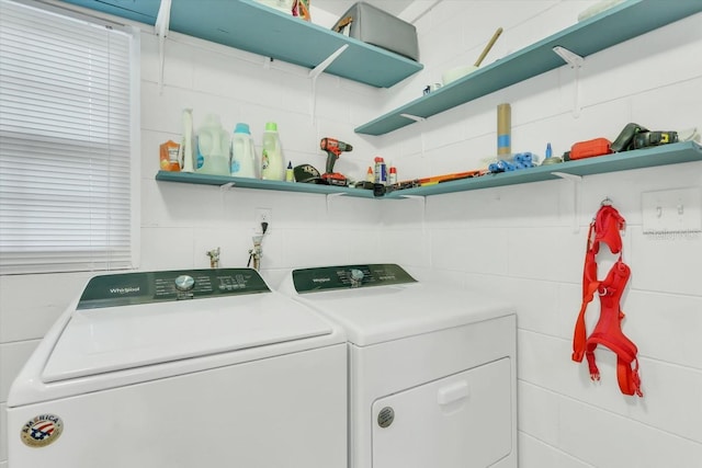 laundry room with washer and clothes dryer