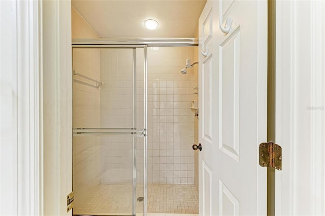 bathroom featuring an enclosed shower