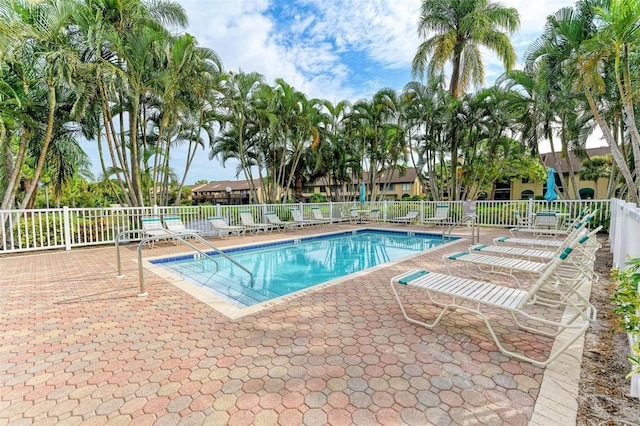 view of swimming pool featuring a patio