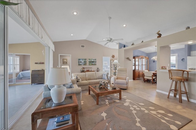 living room featuring light tile patterned flooring, high vaulted ceiling, and ceiling fan