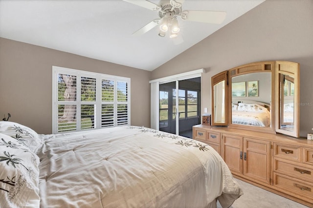 carpeted bedroom with access to exterior, vaulted ceiling, and ceiling fan