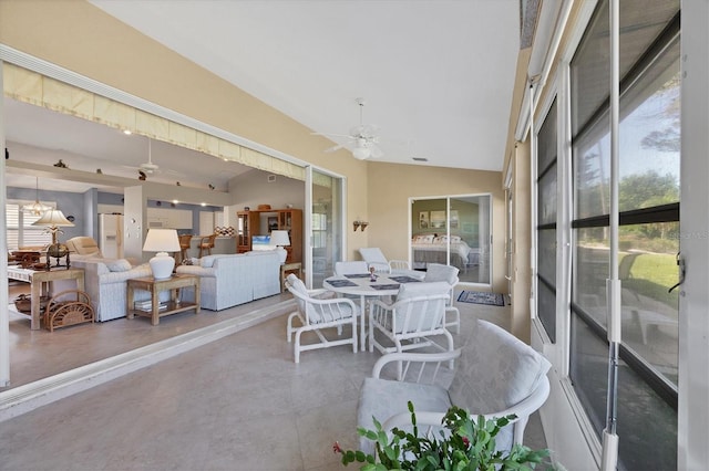 sunroom with vaulted ceiling and ceiling fan