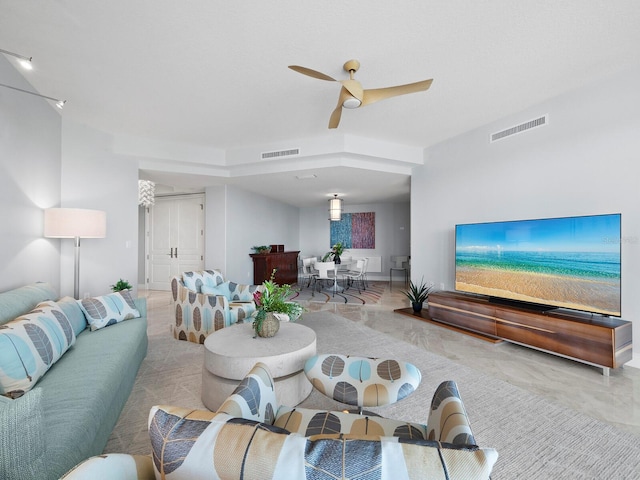 living room with ceiling fan