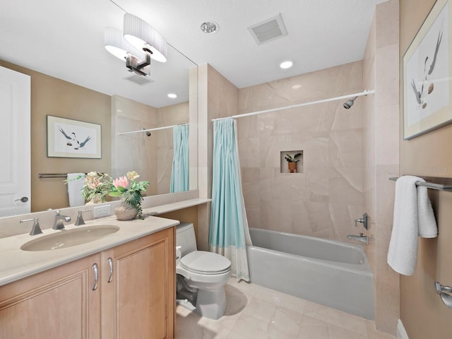 full bathroom with shower / bath combination with curtain, tile patterned floors, vanity, and toilet