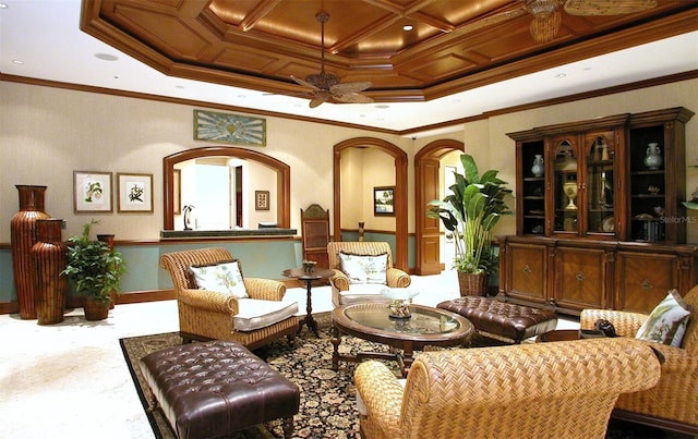 sitting room with crown molding, ceiling fan, coffered ceiling, and carpet floors