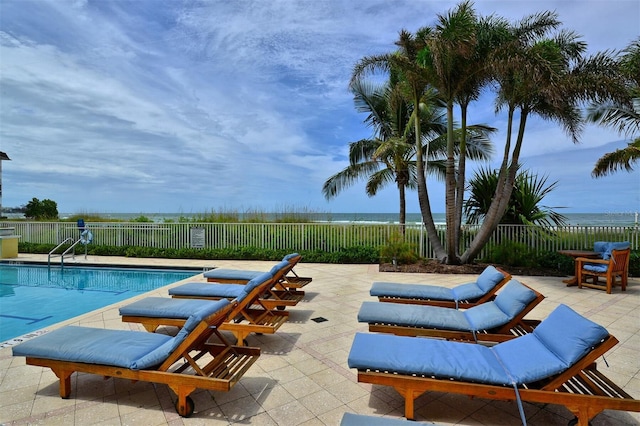 view of swimming pool featuring a patio