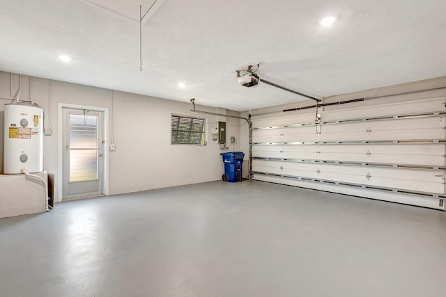 garage with water heater, a garage door opener, and electric panel