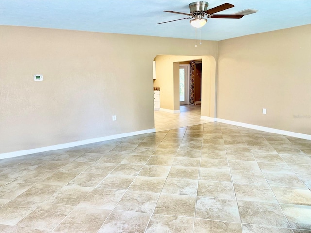 unfurnished room featuring ceiling fan