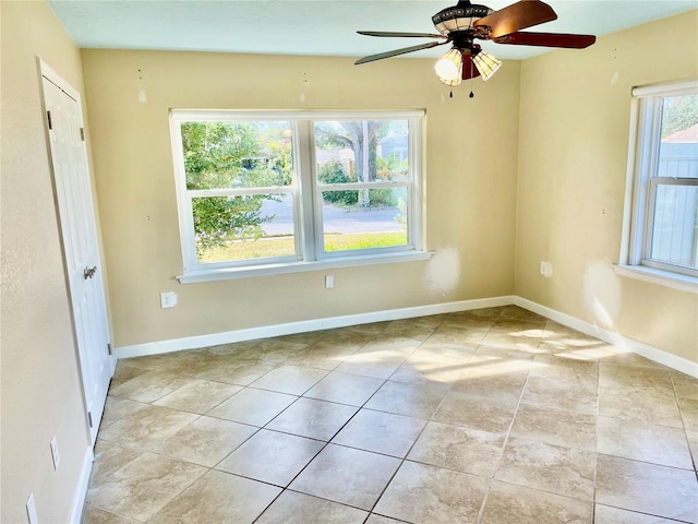 unfurnished room featuring ceiling fan