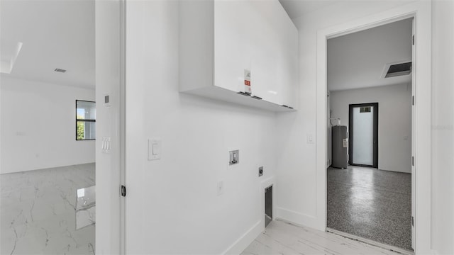 laundry room featuring laundry area, visible vents, electric water heater, washer hookup, and electric dryer hookup