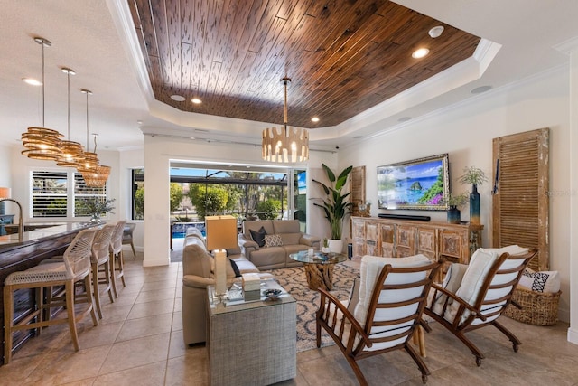 living room with crown molding, light tile patterned flooring, wood ceiling, and a tray ceiling