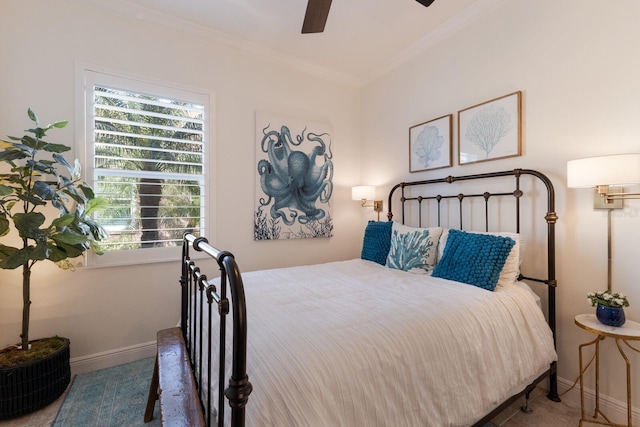 bedroom featuring ornamental molding and ceiling fan