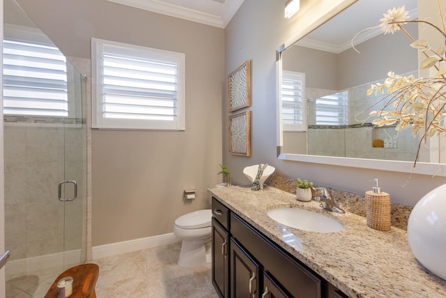 bathroom featuring vanity, toilet, a shower with door, crown molding, and tile patterned floors