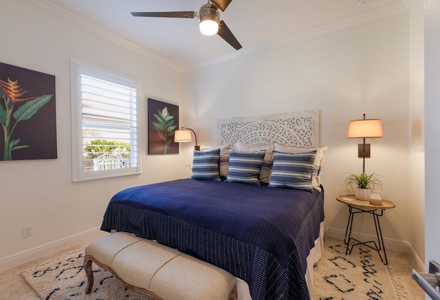 bedroom featuring ceiling fan and ornamental molding