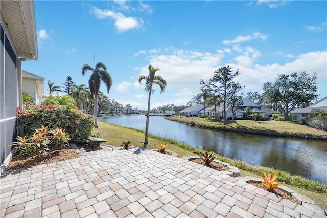 view of patio featuring a water view