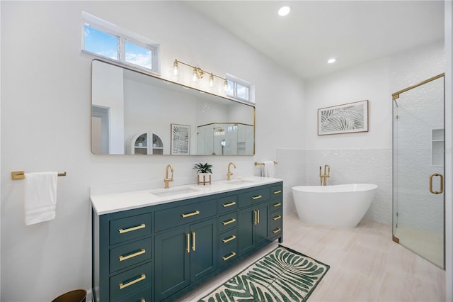 bathroom featuring vanity, shower with separate bathtub, tile patterned flooring, and tile walls