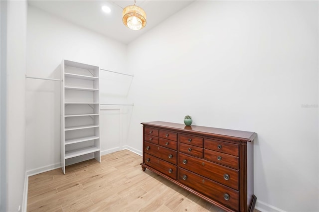 walk in closet featuring light wood-type flooring