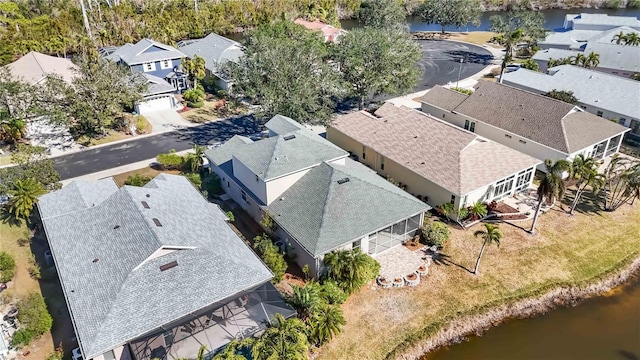 birds eye view of property with a residential view