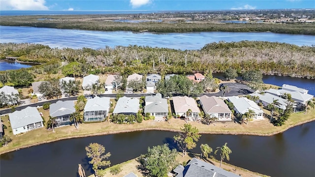 aerial view featuring a water view and a residential view