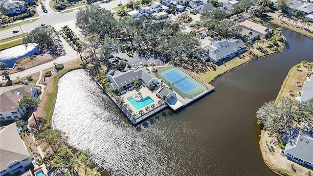 birds eye view of property with a residential view and a water view