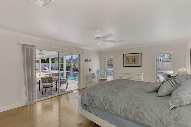 bedroom with multiple windows, access to outside, light hardwood / wood-style floors, and ceiling fan