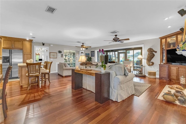 living room with dark hardwood / wood-style floors