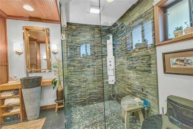 bathroom featuring a shower with door, tile patterned flooring, and wooden ceiling