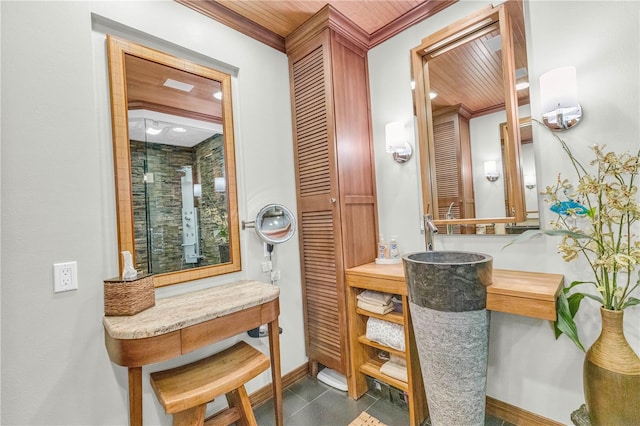 bathroom featuring tile patterned flooring, ornamental molding, sink, and wood ceiling