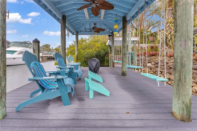 deck with ceiling fan and grilling area