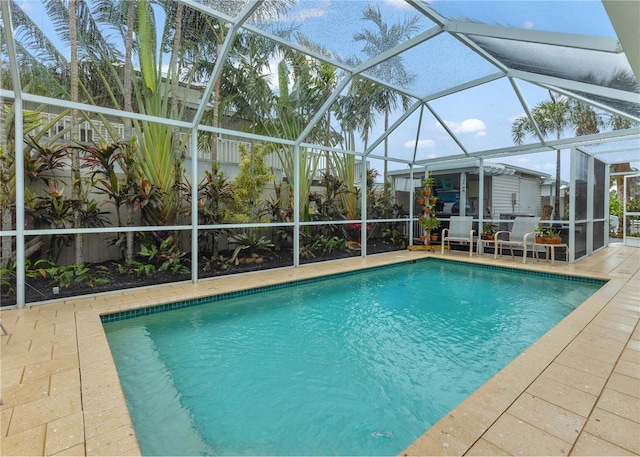 pool featuring a patio area and a lanai