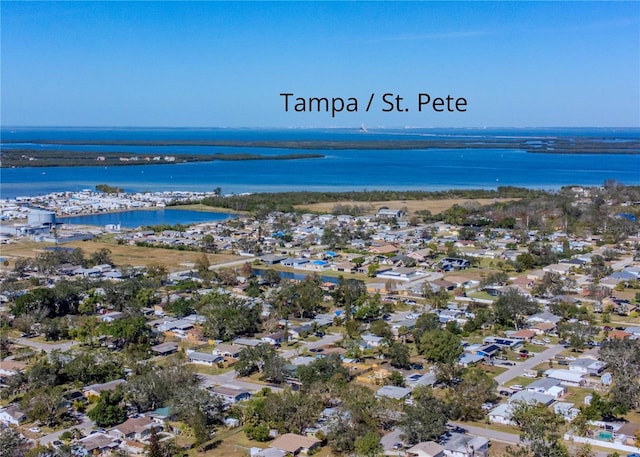 aerial view with a water view and a residential view