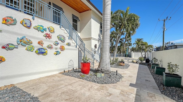 view of community with a patio