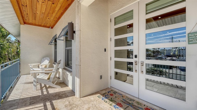 balcony featuring french doors