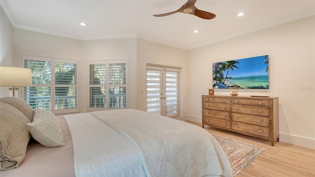 bedroom with ceiling fan, ornamental molding, and light wood-type flooring