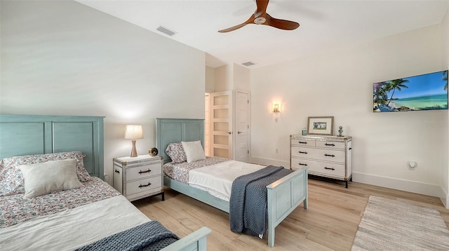 bedroom with light wood-type flooring and ceiling fan