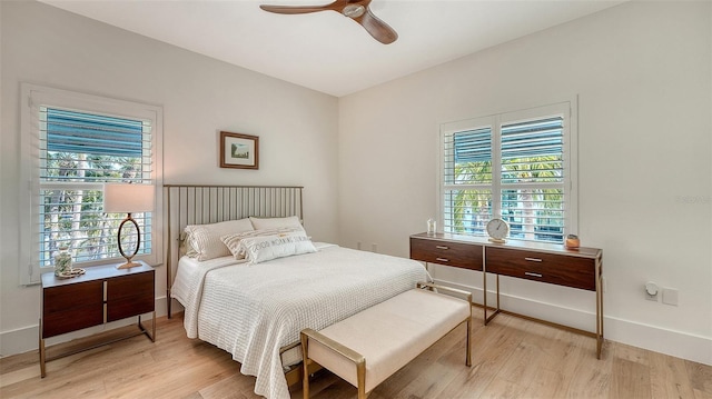 bedroom featuring ceiling fan and light hardwood / wood-style floors