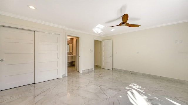 unfurnished bedroom featuring crown molding, ceiling fan, and a closet