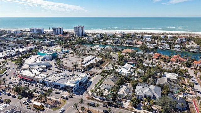 aerial view with a view of the beach and a water view