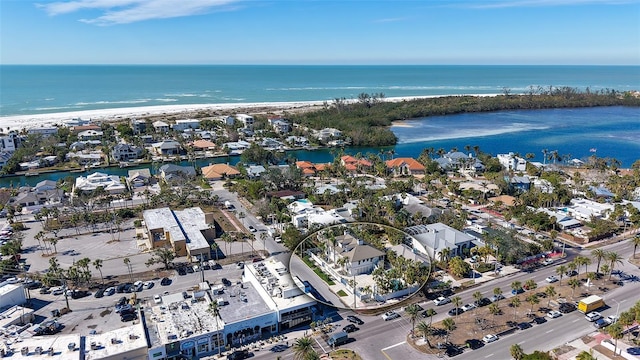 aerial view featuring a water view and a beach view