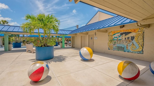 view of home's community with a patio