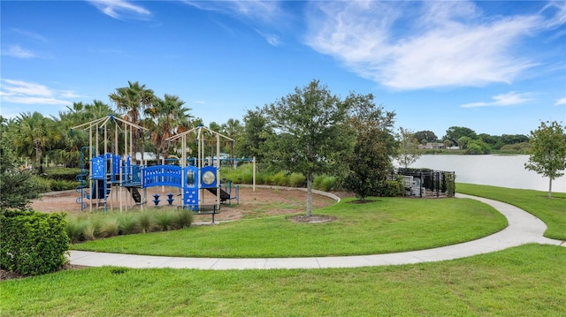 view of jungle gym with a water view and a yard