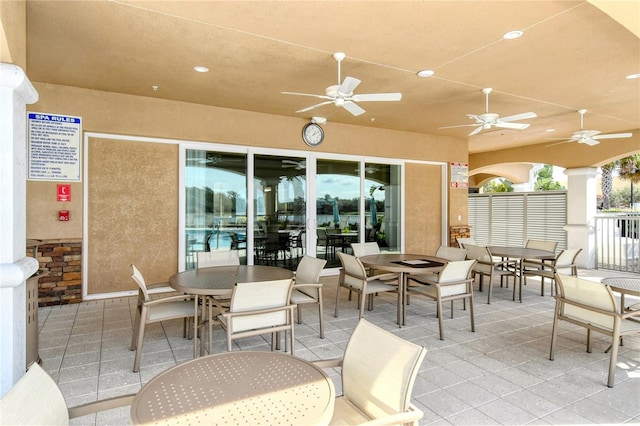 view of patio featuring ceiling fan