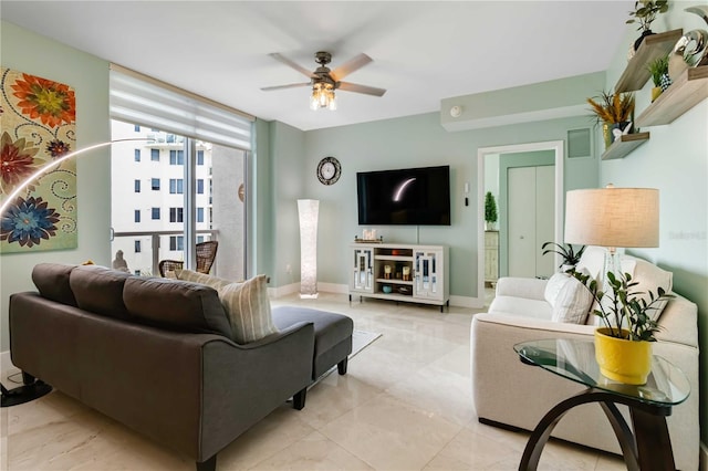 living room with ceiling fan