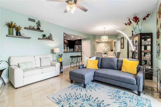 living room featuring ceiling fan